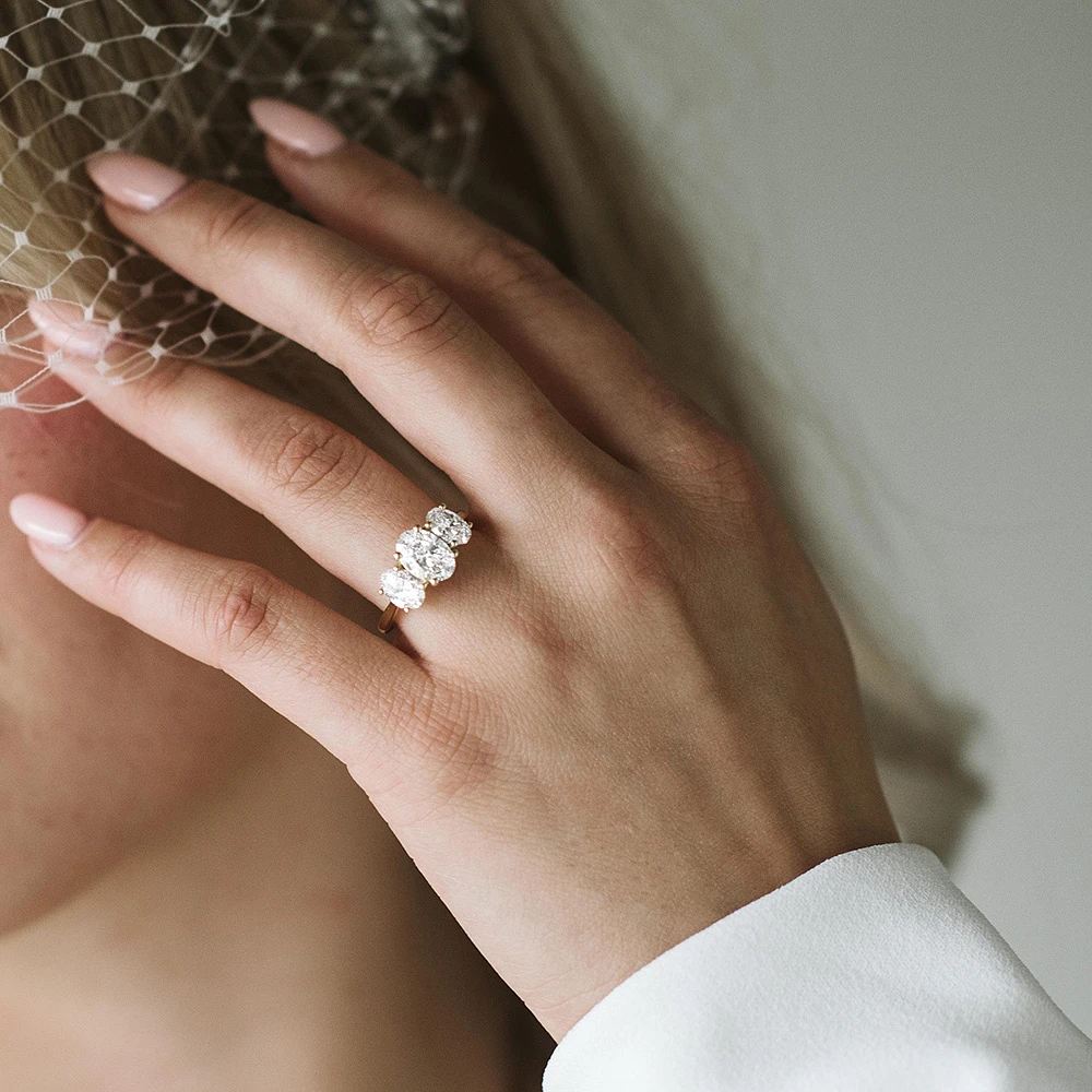 Oval Trinity Engagement Ring with 3.00 Carat TW of Lab Created Diamonds in 14kt Yellow Gold