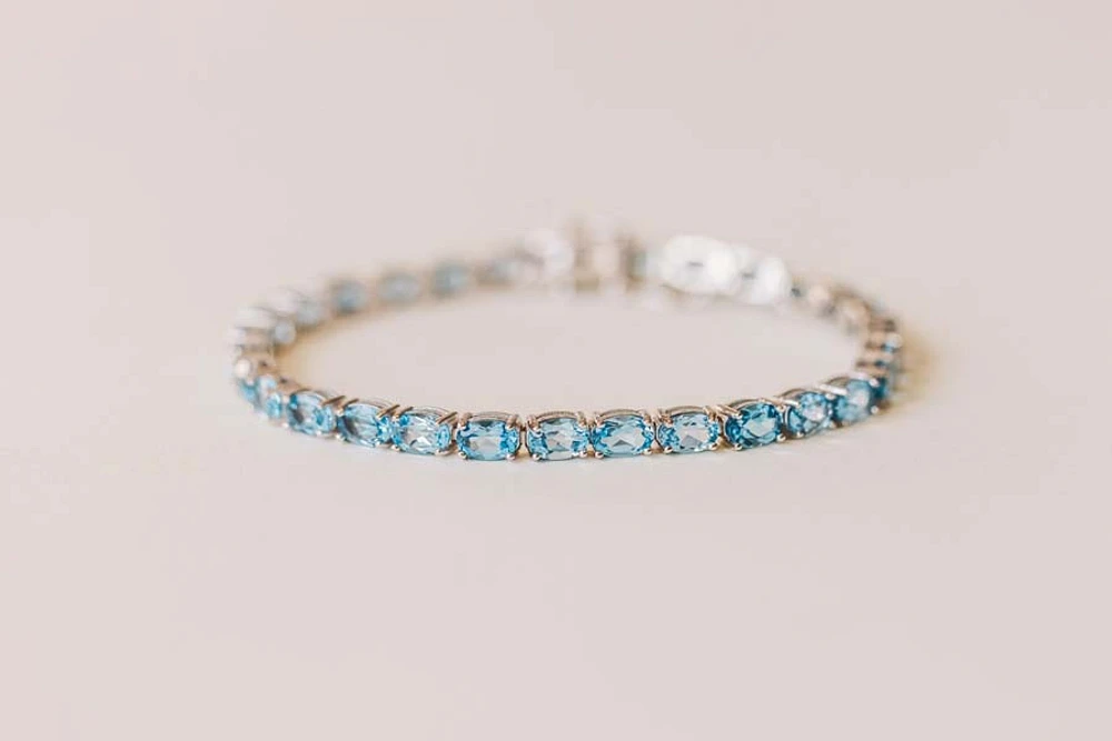 7.5″ Tennis Bracelet with Blue Topaz in Sterling Silver