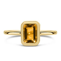Ring with 7x5MM Emerald Cut Citrine in 10kt Yellow Gold