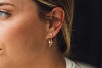 Dangling Star Chain Earrings with .03 Carat TW of Diamonds in 10kt Yellow Gold