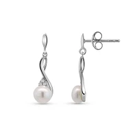 Earrings with 5MM Freshwater Pearl and .03 Carat TW of Diamonds in 10kt White Gold