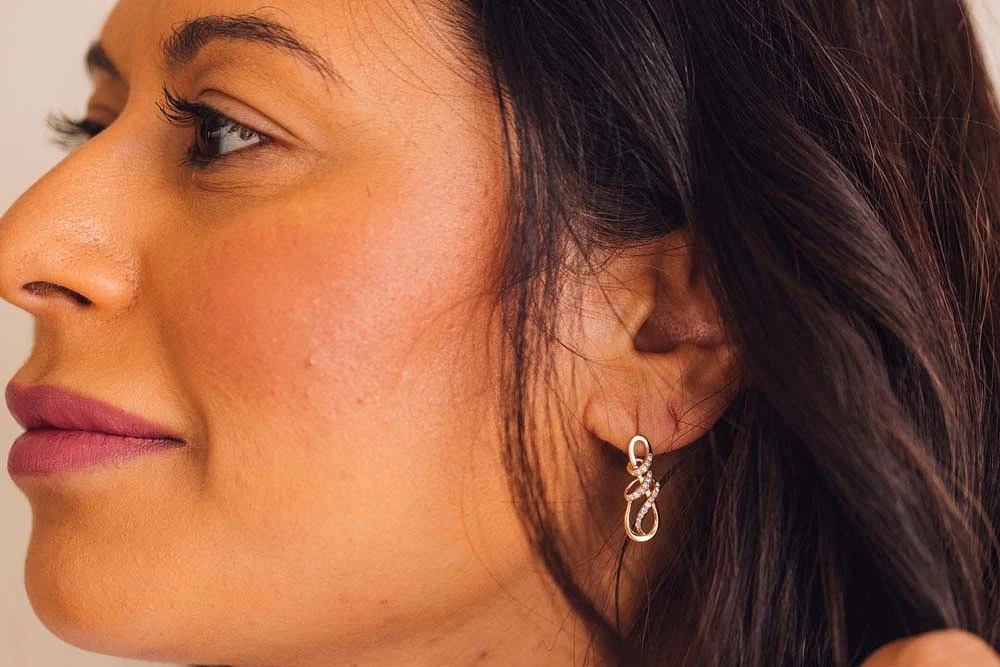 Infinity Earrings with .20 Carat TW of Diamonds in 10kt Yellow Gold