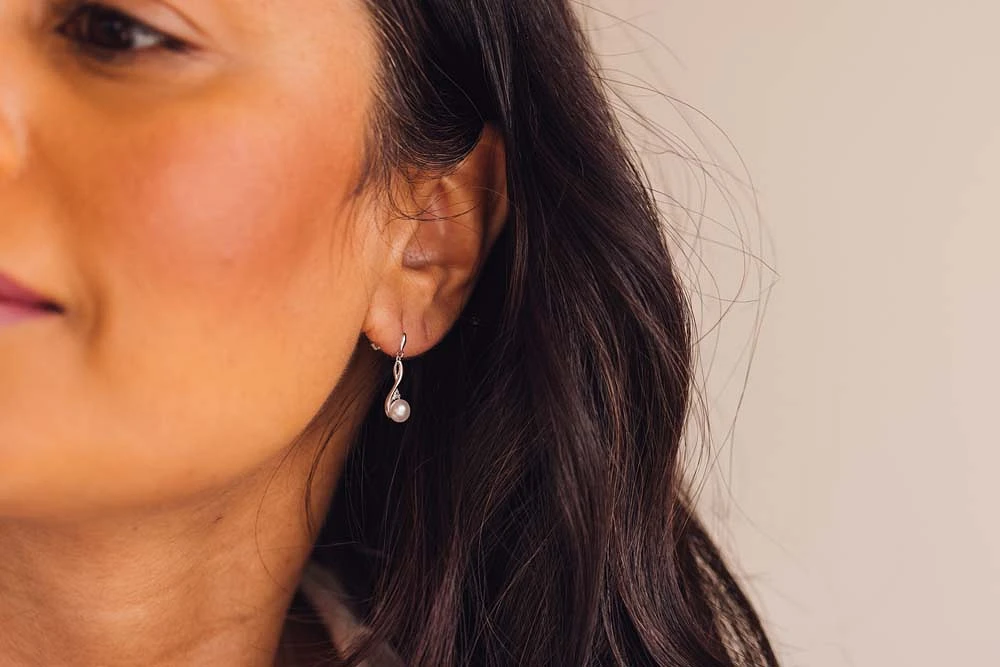 Earrings with 5MM Freshwater Pearl and .03 Carat TW of Diamonds in 10kt White Gold