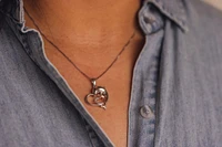 Dolphin Heart Pendant with .05 Carat TW of Diamonds in Sterling Silver with Chain