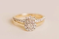 Halo Engagement Ring Set with .50 Carat TW of Diamonds in 10kt Yellow Gold