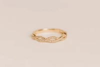 Infinity Ring with .20 Carat TW of Diamonds in 10kt Yellow Gold