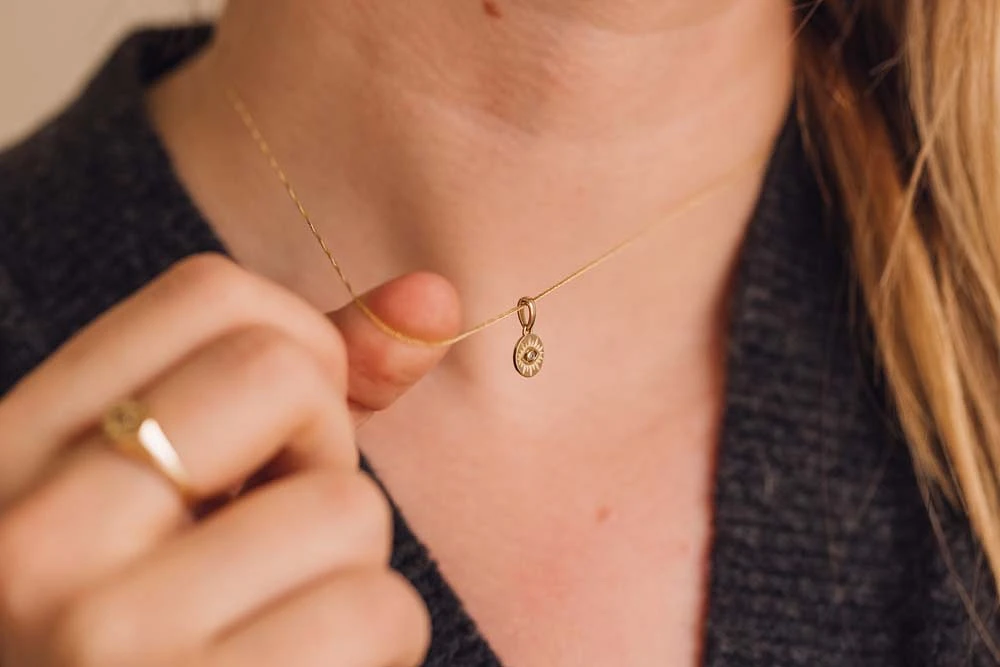 Evil Eye Pendant with .01 Carat Diamond in 10kt Yellow Gold with Chain