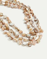 Collier court à chaînes multiples à billes en coquillages