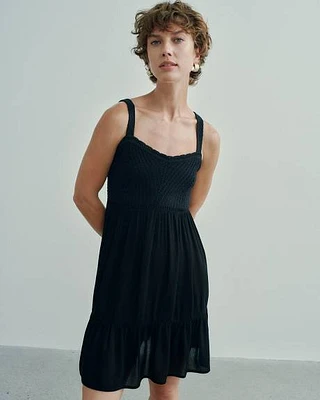 Robe cintrée et évasée sans manches
