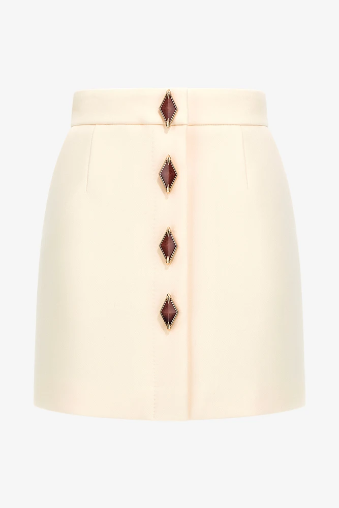 Skirt with jewels buttons
