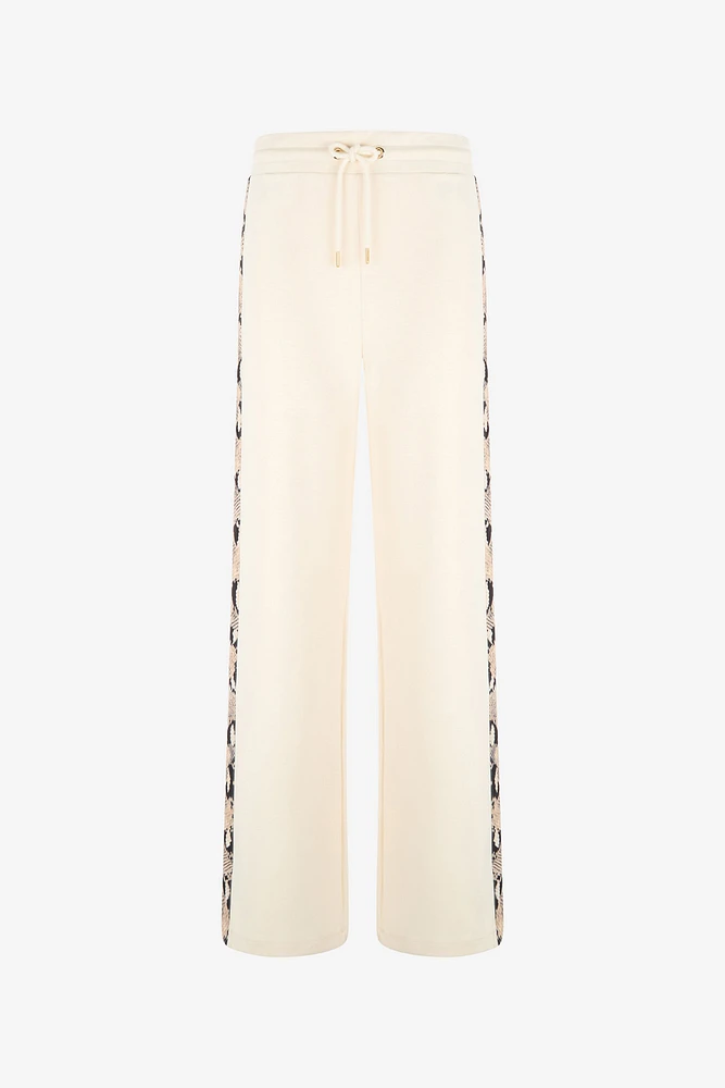 Trousers with snake bands