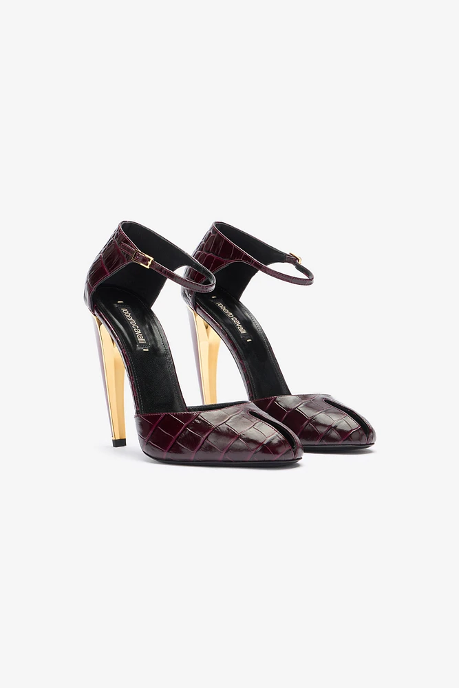 Printed leather pumps with Fang heel