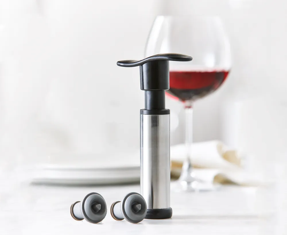 Pompe à vin et bouchons Monsieur Bar
