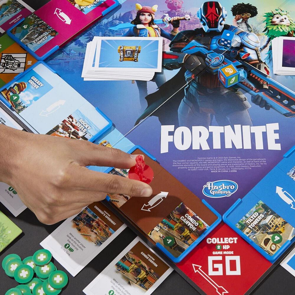 Monopoly Flip édition : Fortnite, jeu de plateau Monopoly inspiré du jeu vidéo Fortnite