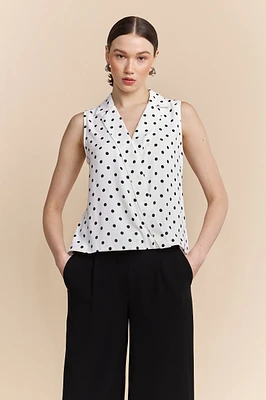 Polka dots sleeveless top with draped front