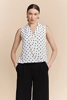 Polka dots sleeveless top with draped front