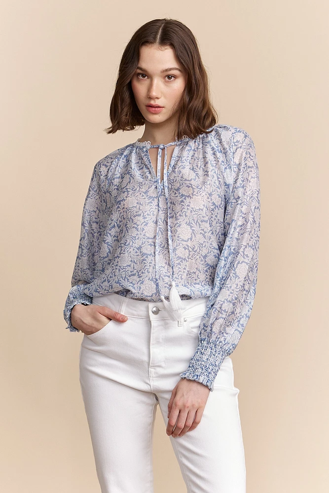 Blouse semi-transparente avec imprimé floral