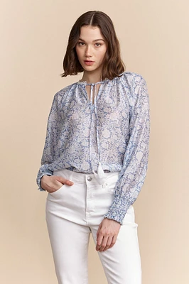 Blouse semi-transparente avec imprimé floral