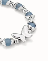 Beaded bracelet with blue crystals and a central butterfly