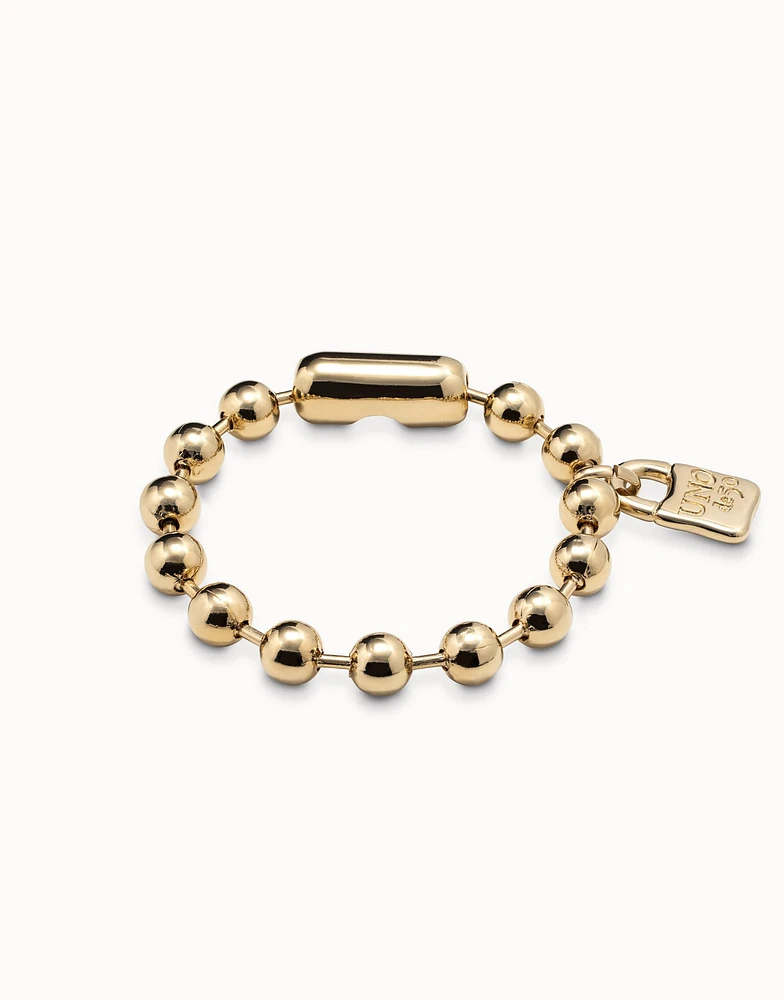 Beaded bracelet with a padlock charm