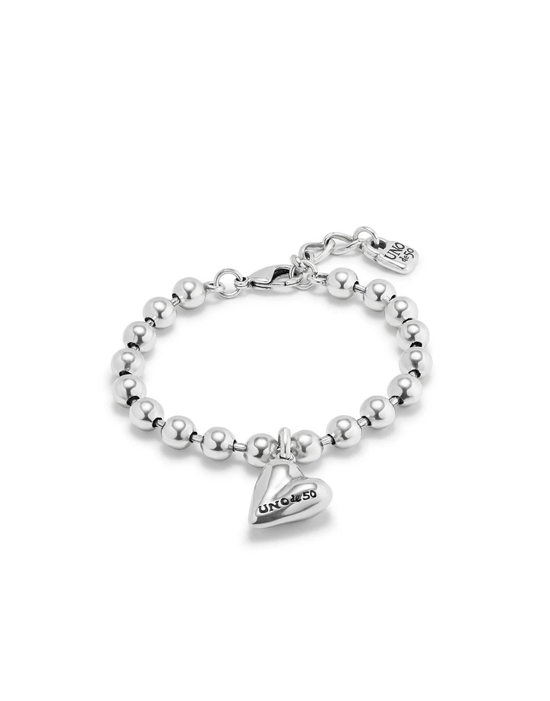 Beaded bracelet with a heart charm