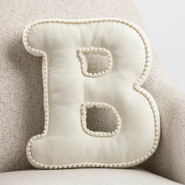 Kirklands Ivory Monogram B Shaped Pom Pom Pillow at Hamilton Place